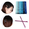 A set of 24 glitter wavy hair clips and bobby pins in various shades of blue and purple.
