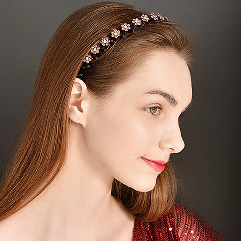 A close-up profile of a woman with long brown hair wearing sparkle rhinestone elastic hair hoops.