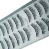 A close-up of a cosmetic palette showing various styles of black mink false eyelashes.
