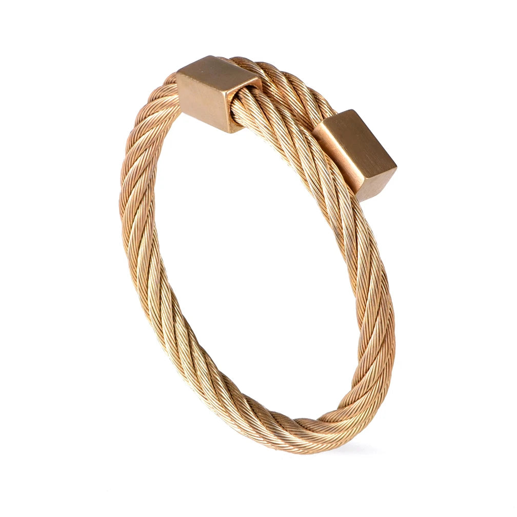 A luxury Roman number stainless steel bracelet made of twisted gold-toned wire and square metal findings.