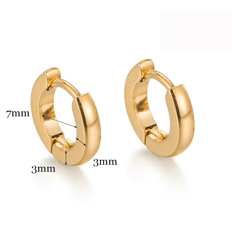 A pair of minimalist gold hoop earrings shown with dimension lines.