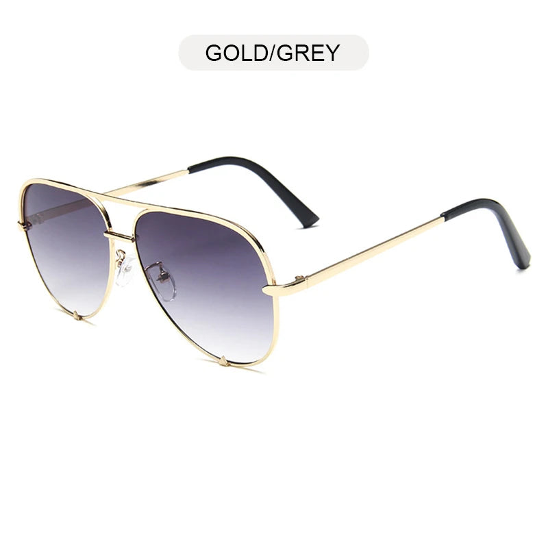 Gold and grey aviator sunglasses with gradient black lenses and black frames