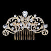 Gold-toned bridal hair comb tiara featuring clear rhinestones and a central diamond-shaped stone.