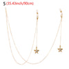 A delicate gold-tone chain necklace with a star pendant and a matching lanyard for eyeglasses.