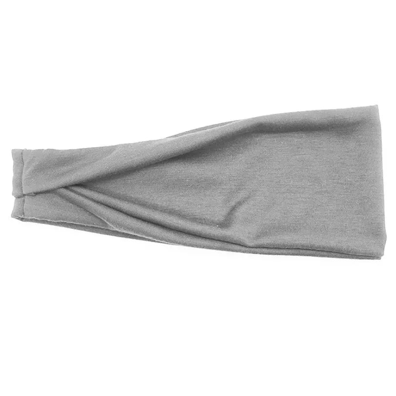Graues Baumwoll-verzwirntes Stirnband, flach dargestellt.