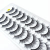 A strip of dramatic mink false eyelashes displayed on a white plastic tray.