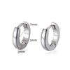 A pair of minimalist gold hoop earrings shown with various size measurements.
