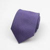 A purple patterned necktie with a textured weave is shown folded on a white background.