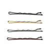 Three metal hair clips in black, gold, and brown for styling