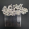 Silver rhinestone bridal hair comb tiara featuring pearl and crystal embellishments