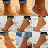 Gold and silver heart chain anklets worn on the feet of a woman in outdoor settings.
