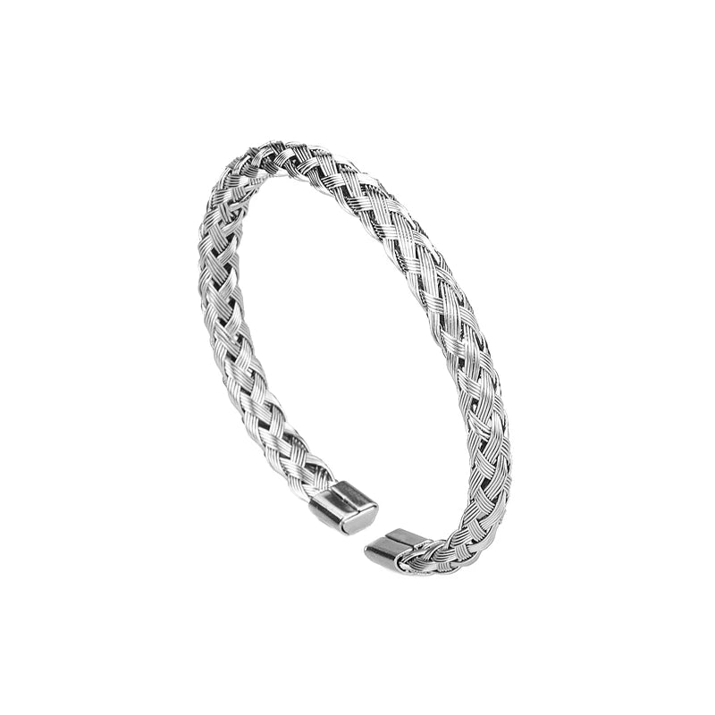 A silver stainless steel bracelet featuring a Roman numeral design, shown on a white background.