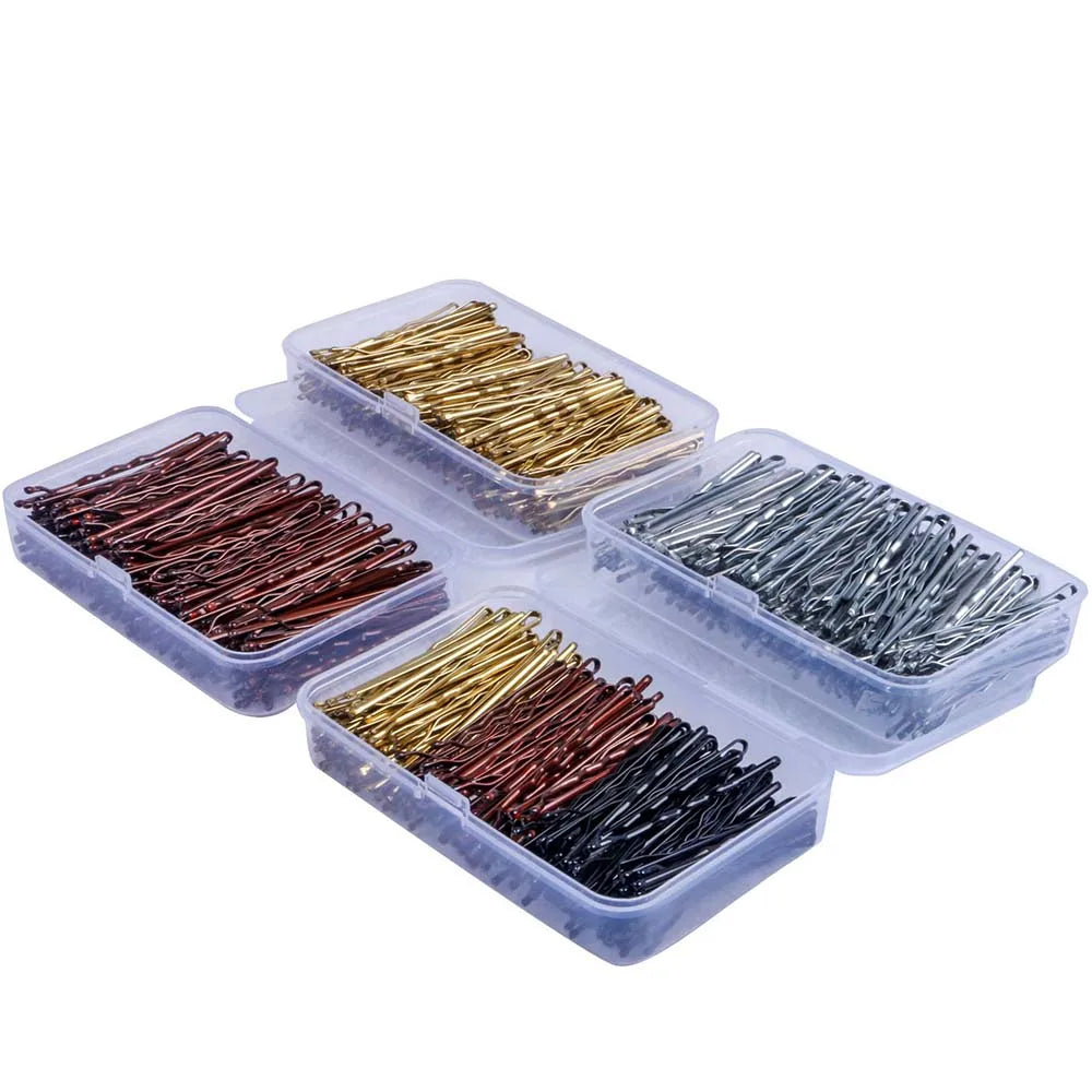 Clear plastic containers filled with various colored metal hair clips for styling