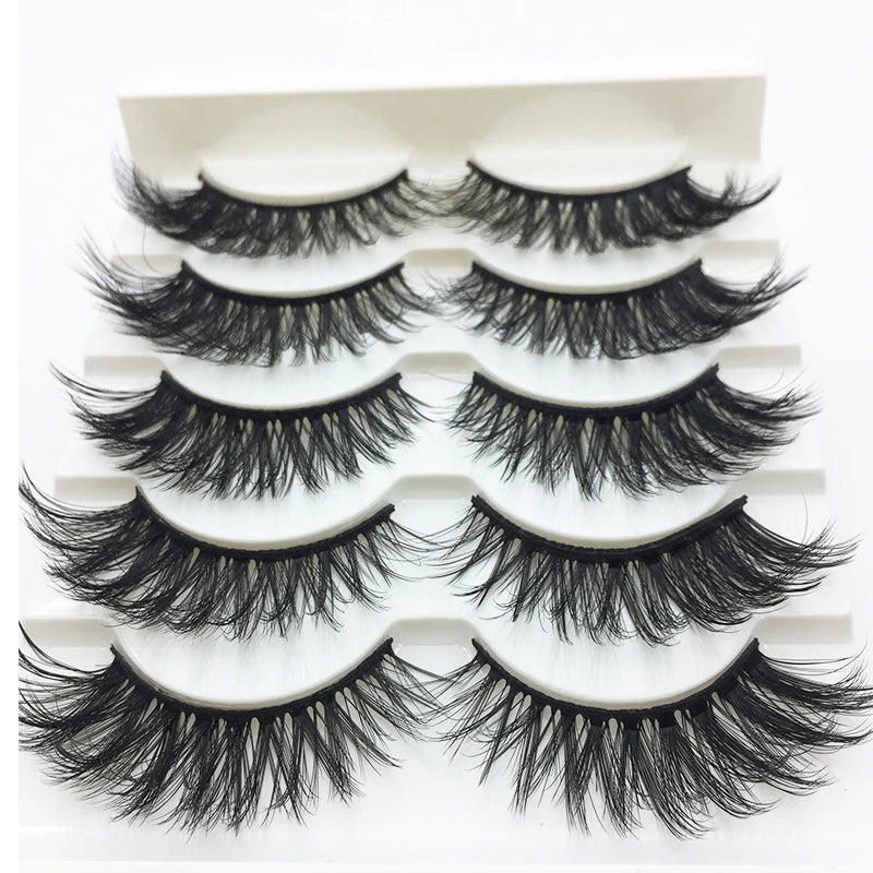 A display of handmade 3D mink false eyelashes in various styles and lengths.
