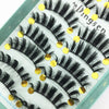A display of black 3D mink false eyelashes on a light green background.