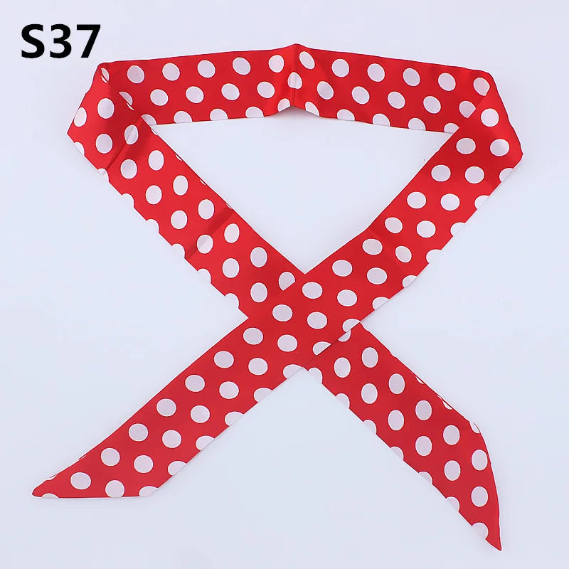Red and white polka dot ribbon shaped like a cross for a S37 product