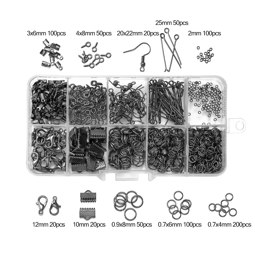 A collection of jewelry findings including clasps, hooks, jump rings, and various sizes in a clear plastic tray.