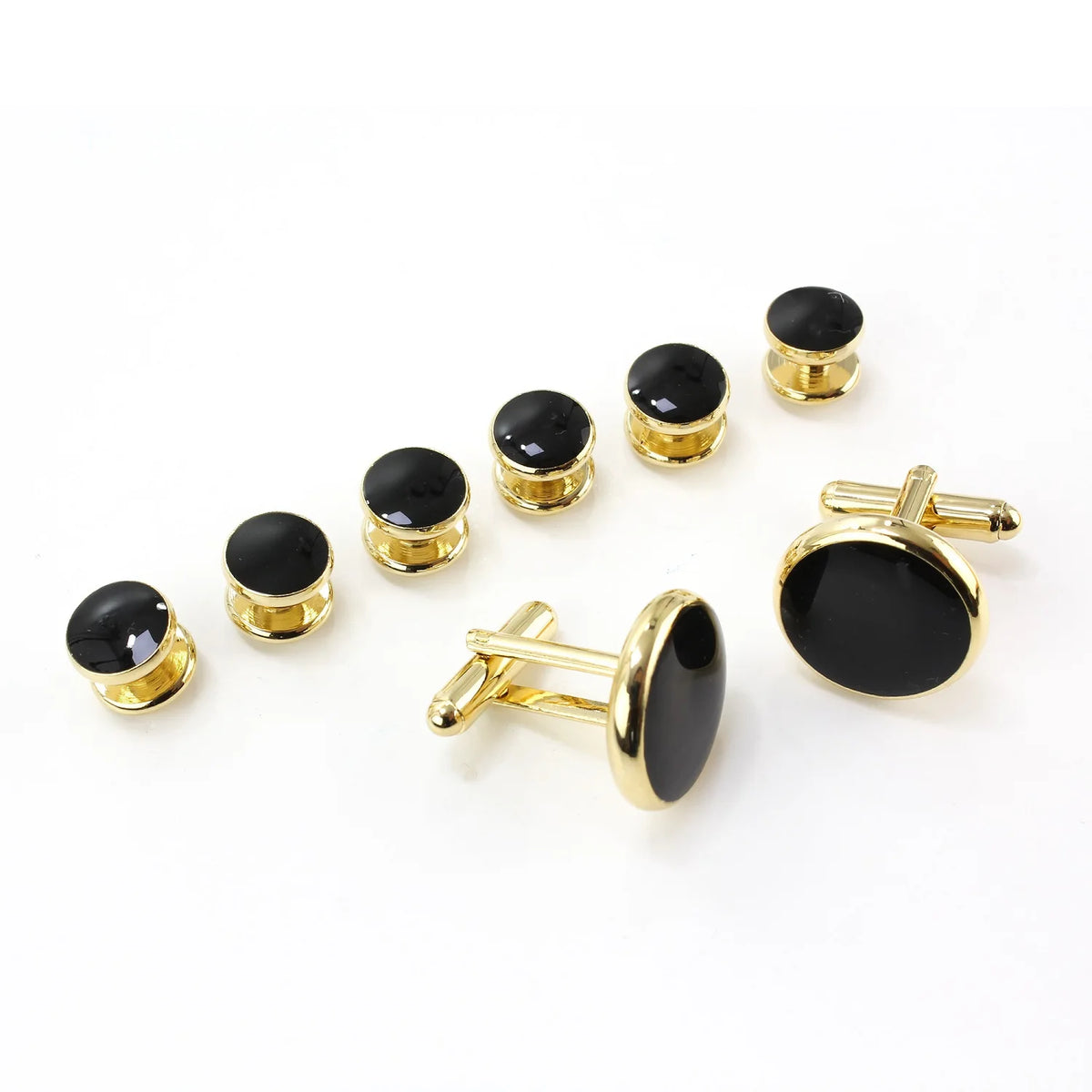 Un set d'”（cufflinks et serre-cravates élégants pour hommes avec des pierres d'onyx noir dans un métal doré.