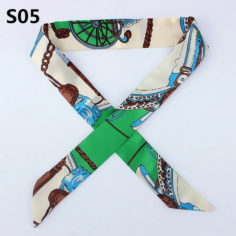 A silk headband scarf with a multi-color leopard print design tied in an 'X' shape.