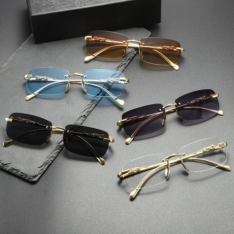 A collection of rimless square sunglasses in brown, blue, and black shades displayed on a dark gray surface.