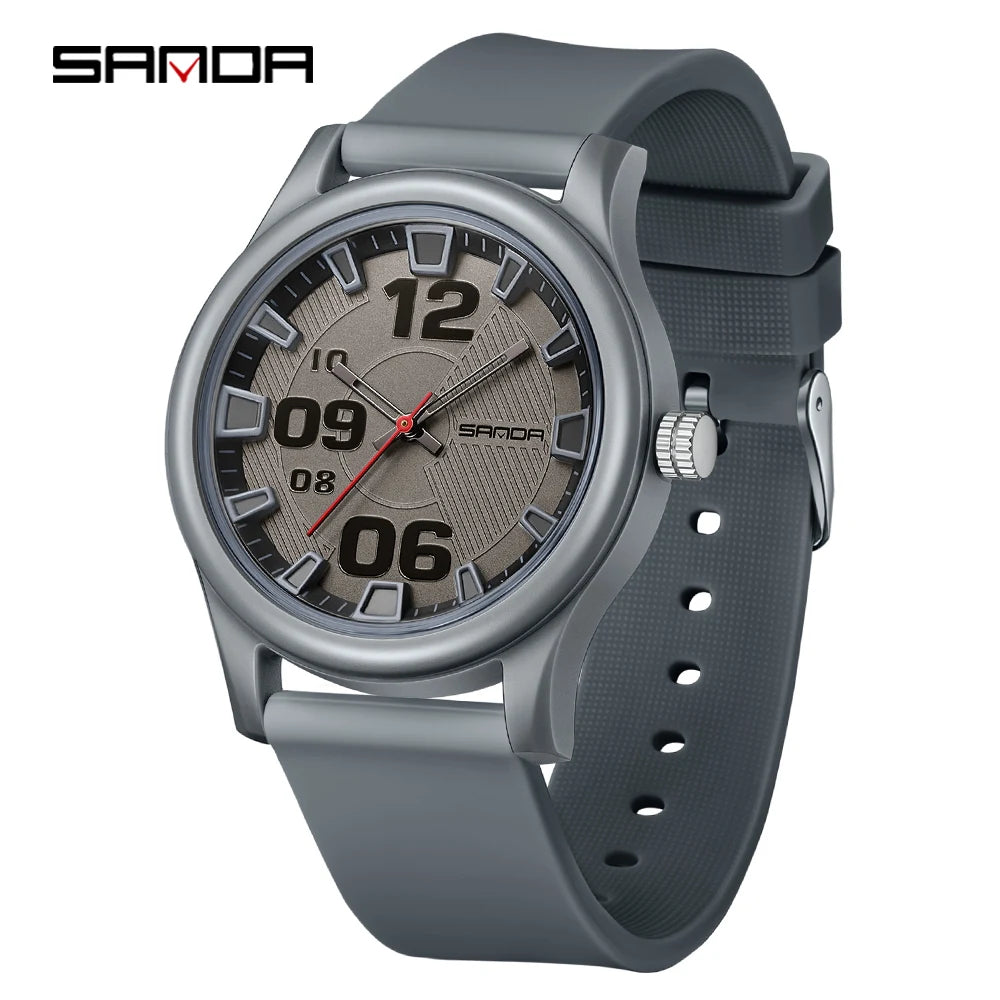 A gray classic quartz fashion watch with a dark dial and silver bezel and silicone strap.