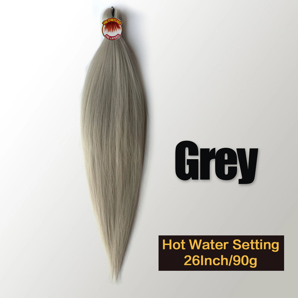 A bundle of grey pre-stretched Kanekalon braiding hair extensions with a heat setting label visible.