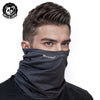 A man wearing a gray Musion mask scarf covering his lower face.