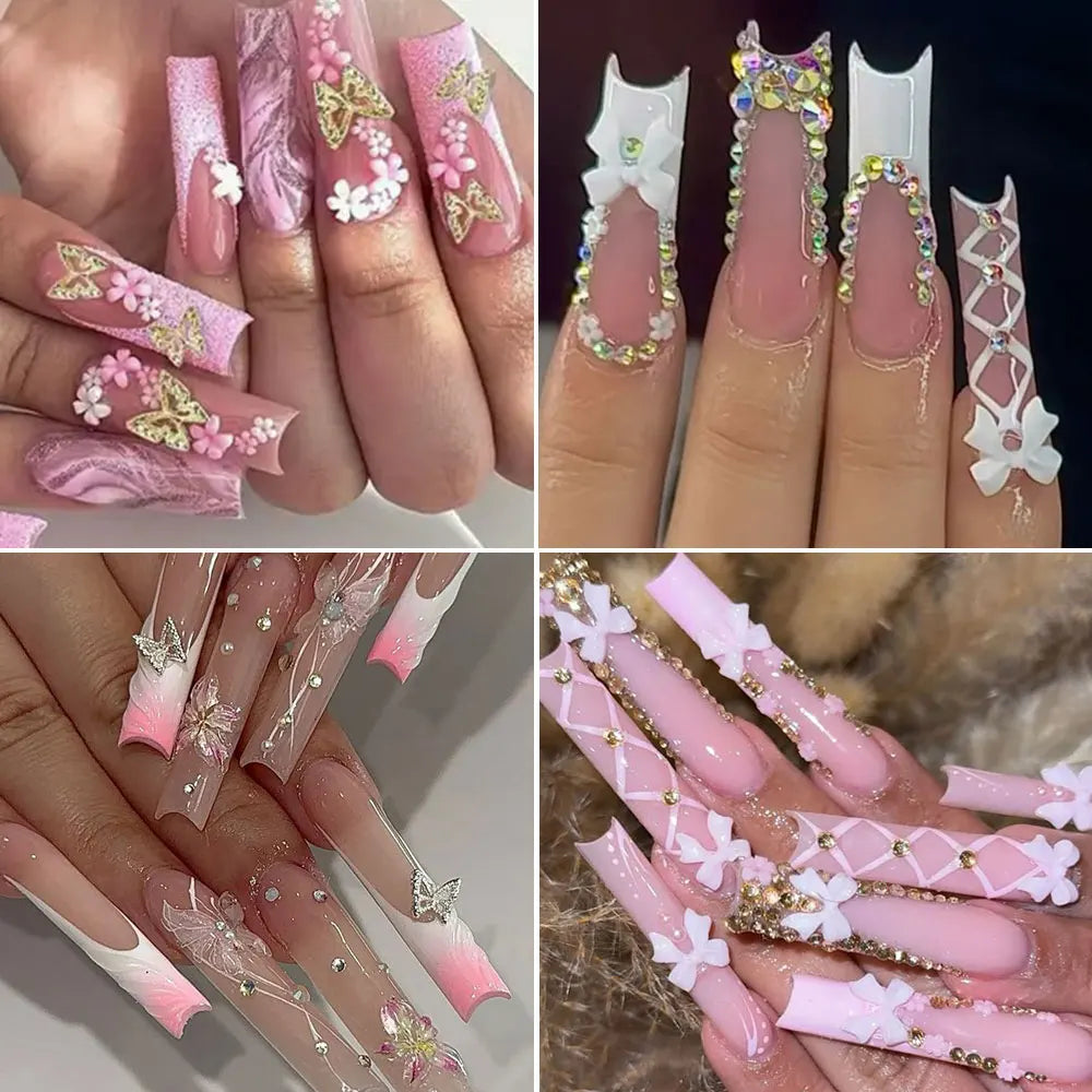 Close-up of hands displaying various pink and white butterfly bow nail charms on manicured fingernails.