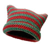 A knitted beanie hat made of red and green yarn with a textured stitch pattern.