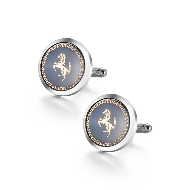 A pair of elegant copper cufflinks featuring a detailed lion motif and an ornate border.