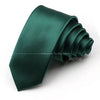 A dark emerald green satin neck tie folded and displayed on a white background.