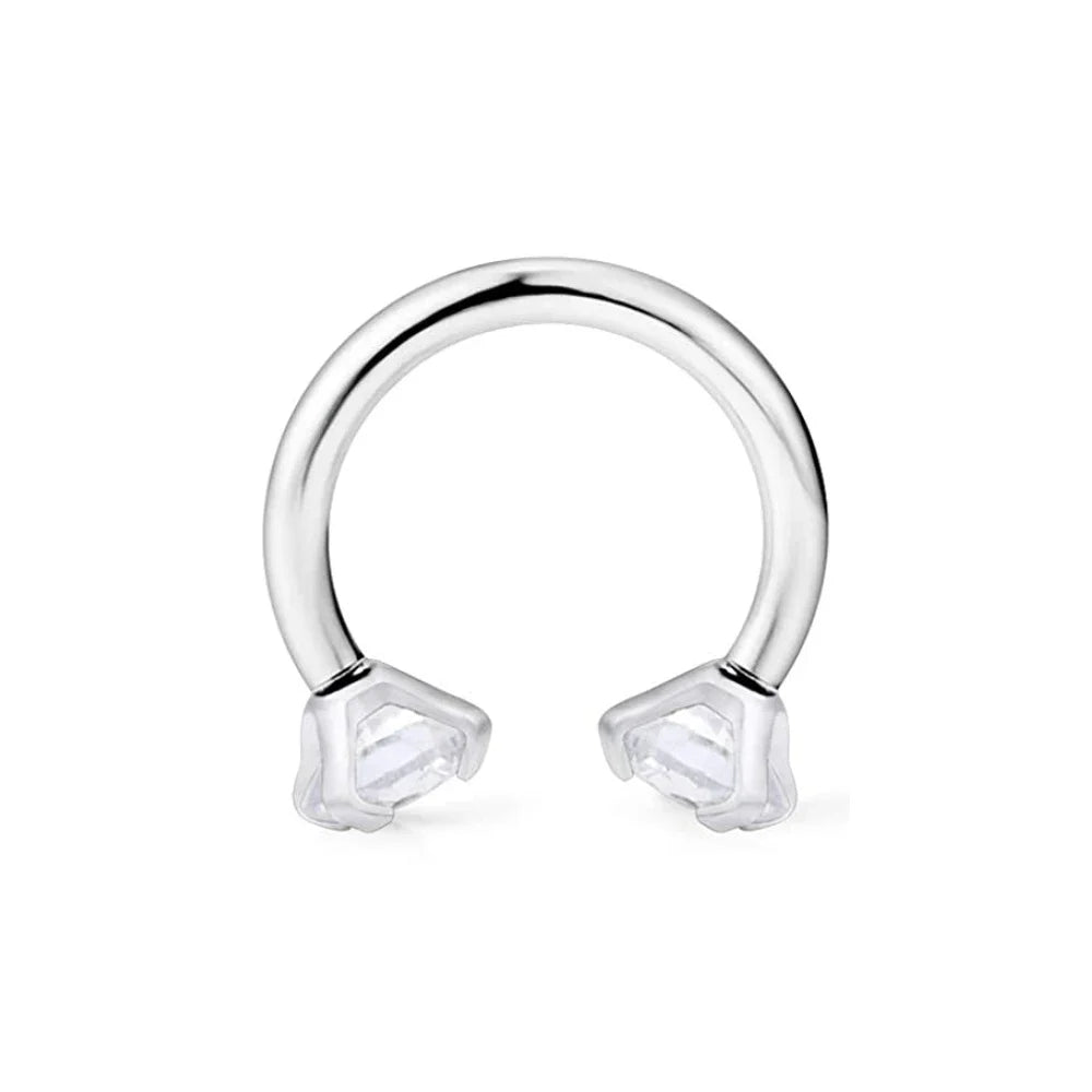A silver horseshoe barbell ring set featuring a polished metal body jewelry design.