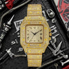 A gold diamond crystal quartz wristwatch for men displayed on a black textured background with tools.