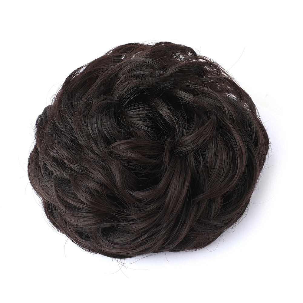 A dark brown messy bun hairstyle made from hair