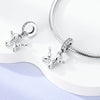 Sterling silver devil's eye charm bracelet featuring a silver charm and a silver chain.