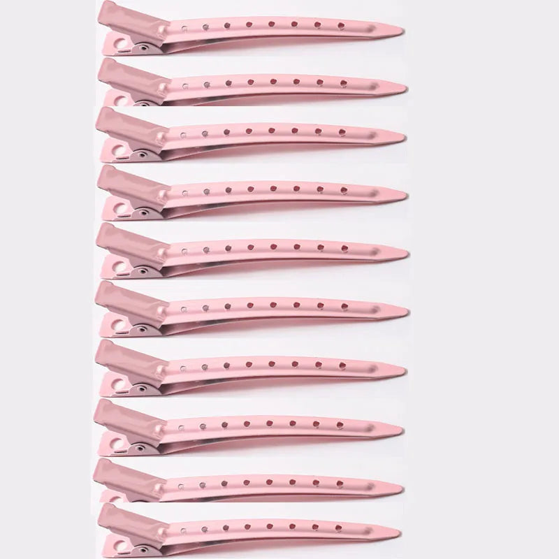 A vertical arrangement of multiple professional fixed hair pins in a rose gold color.