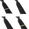 Black necktie with a silver and gold tie clip detail.