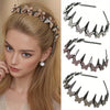 A close-up of a woman wearing a gold and rose gold rhinestone butterfly hair accessory.