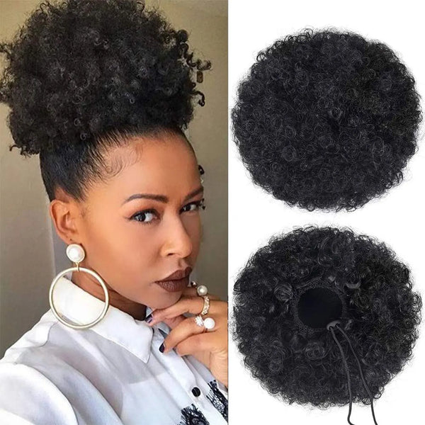 A woman shows off a kinky drawstring ponytail extension hairstyle.