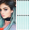 Close-up of a woman with blue-green hair showing straight hair extensions in various shades.