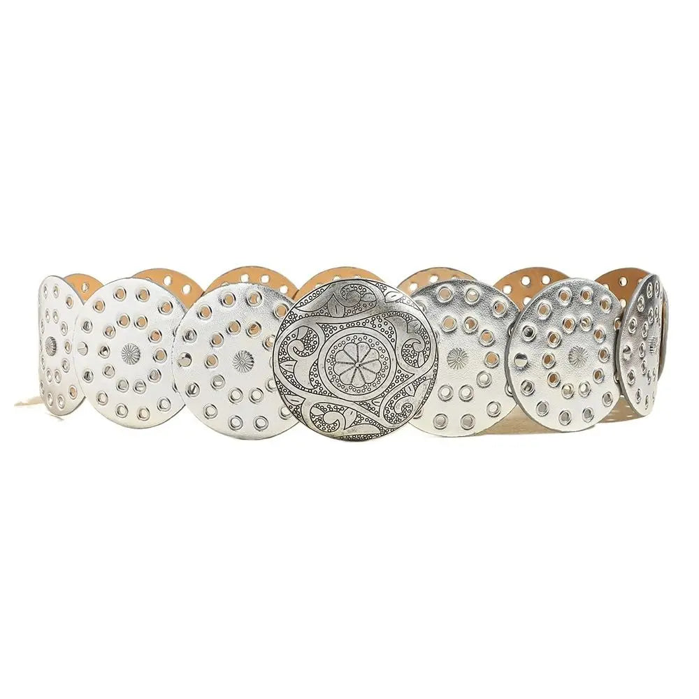 A collection of vintage PU disc belts featuring metal buckles and decorative patterns.