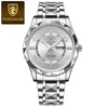 Silver men's quartz watch with a luminous dial and a stainless steel bracelet.
