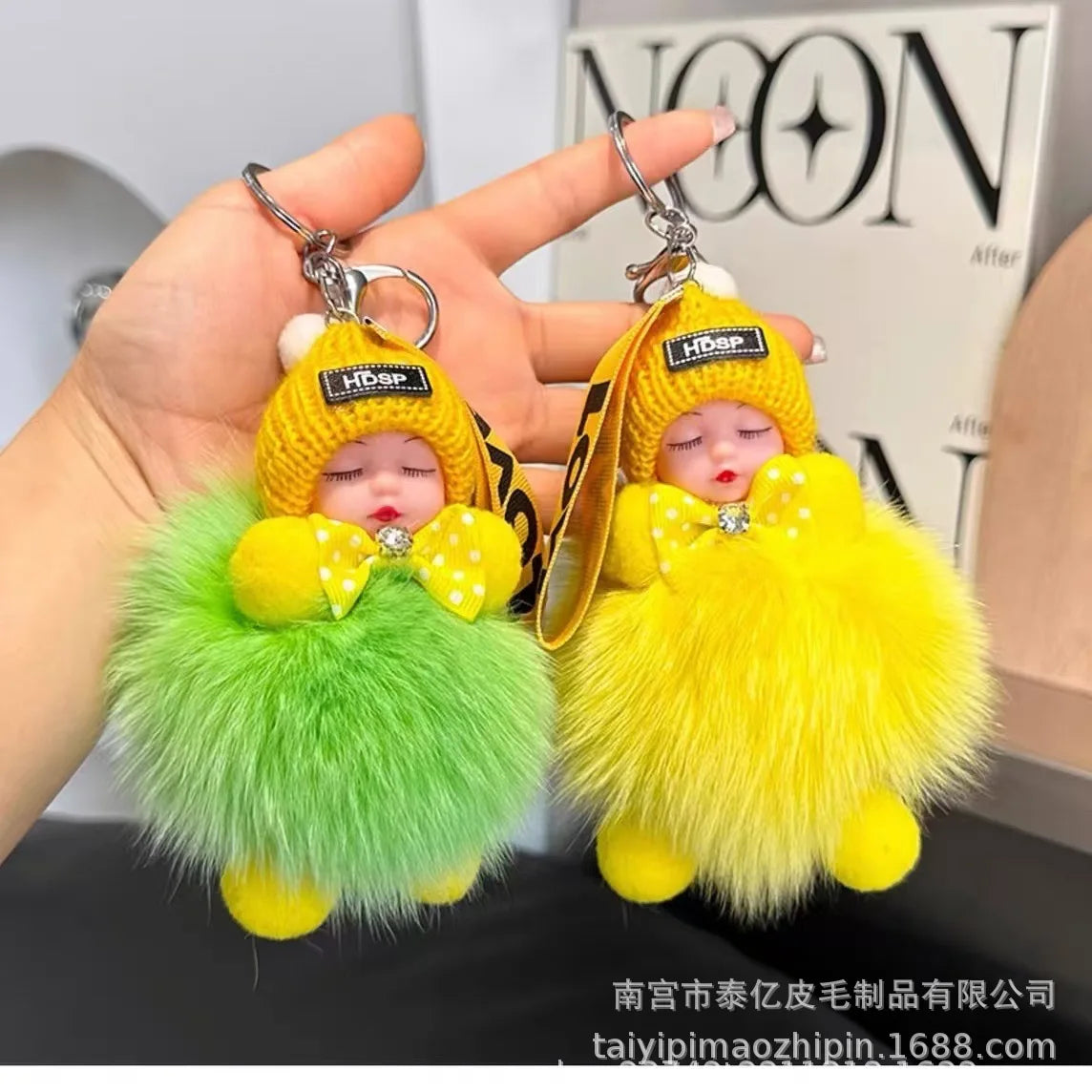 Yellow and green fluffy cartoon plush doll keychain with gold hardware