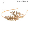 Gold leaf headband featuring delicate olive or laurel leaves for bridal and party accessories.