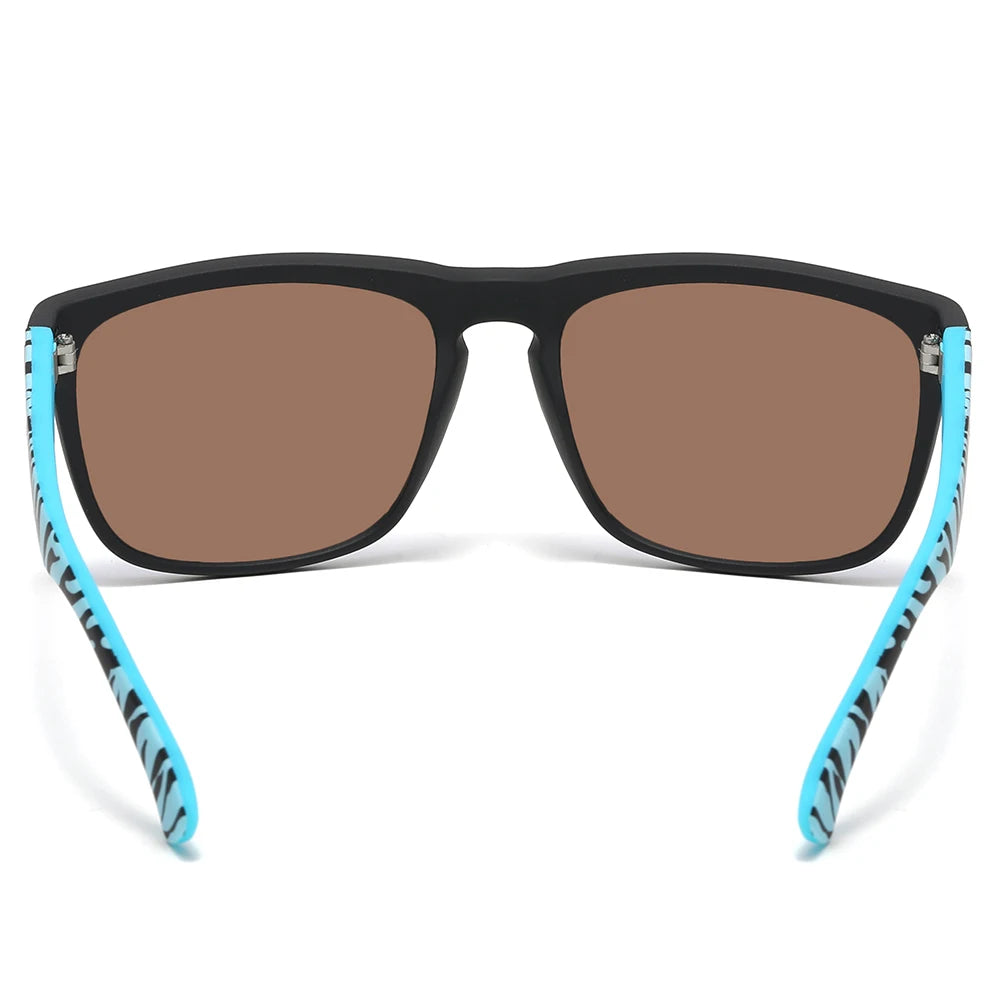 Une paire de lunettes noires avec des verres marron et des branches à motifs turquoise.
