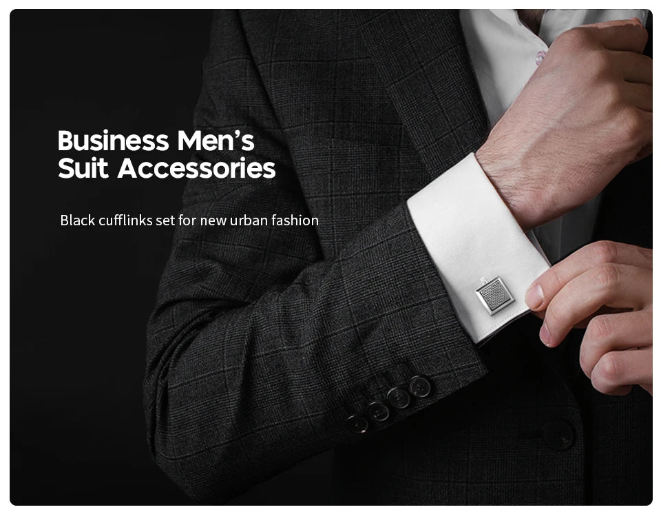 A close-up of a man's suit jacket sleeve showing black cufflinks set for new urban fashion.
