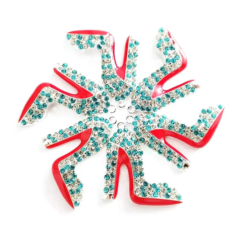 Ein Set eleganter High-Heel-Schmuck mit roten und klaren Kristallen im Sternenmuster.