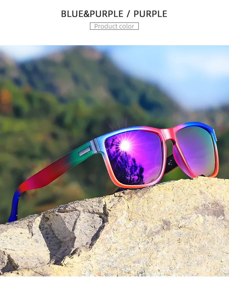 Purple and blue gradient square polarized sunglasses resting on a light-colored rock outdoors.