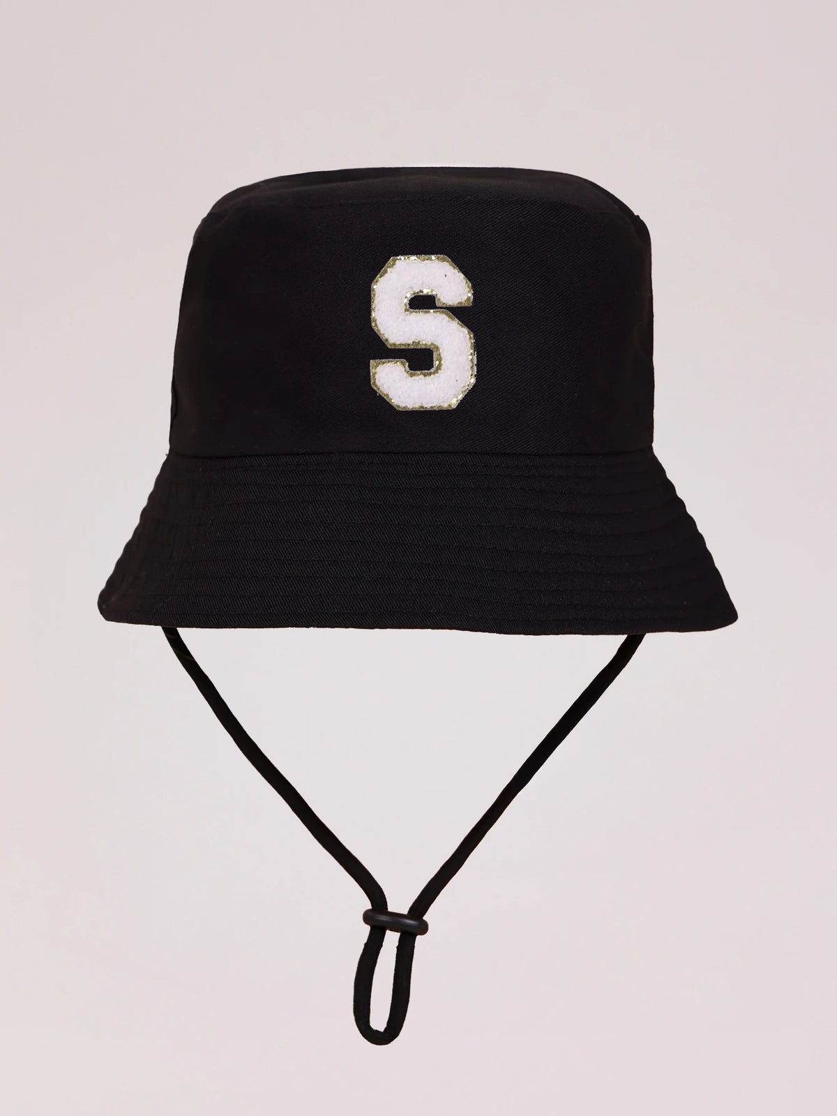 Black sun hat with a white letter S embroidered on the front and an adjustable cord.