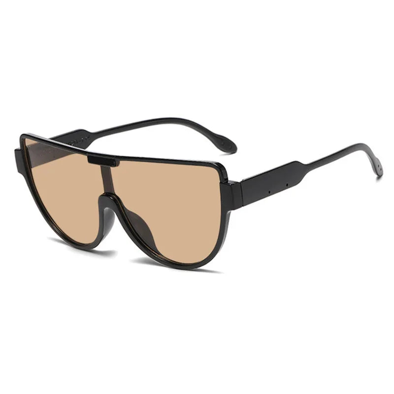 A pair of vintage cat eye sunglasses with brown tinted lenses and black frames.